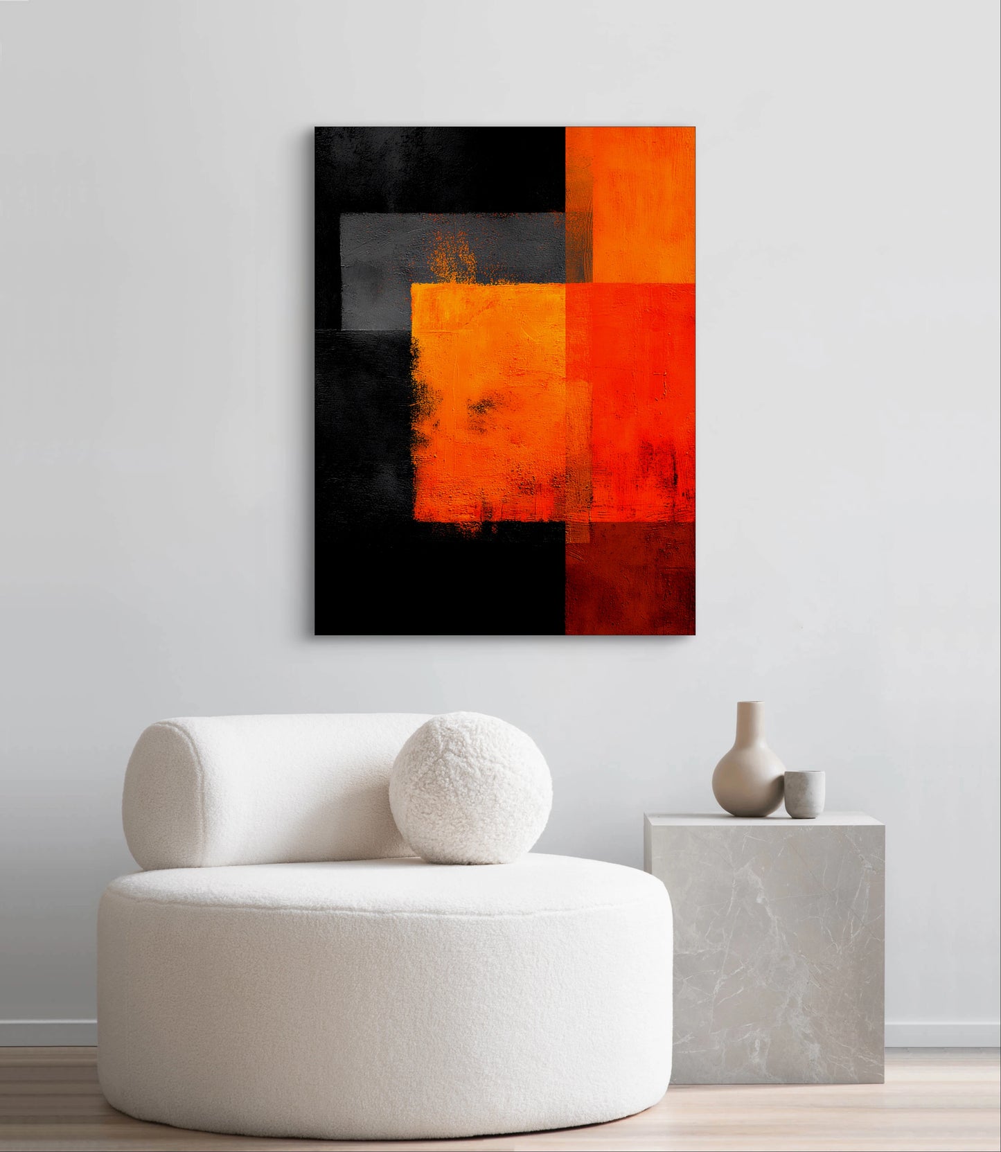 Abstract schilderij Vuurvlak in rood, oranje en zwart boven een witte ronde stoel in modern interieur
