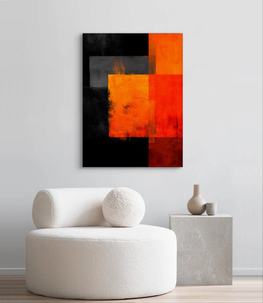 Abstract schilderij Vuurvlak in rood, oranje en zwart boven een witte ronde stoel in modern interieur
