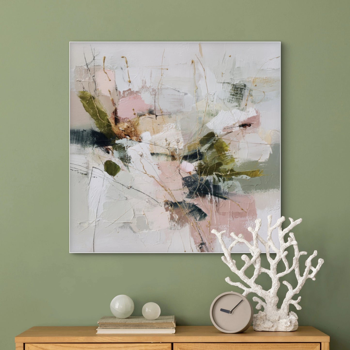 Mock-up van kunstwerk Whisper of Dawn aan een groene muur boven houten kast met decoratieve objecten 
